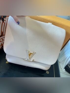 LOUIS VUITTON
Galet Taurillon Leather Volta Bag